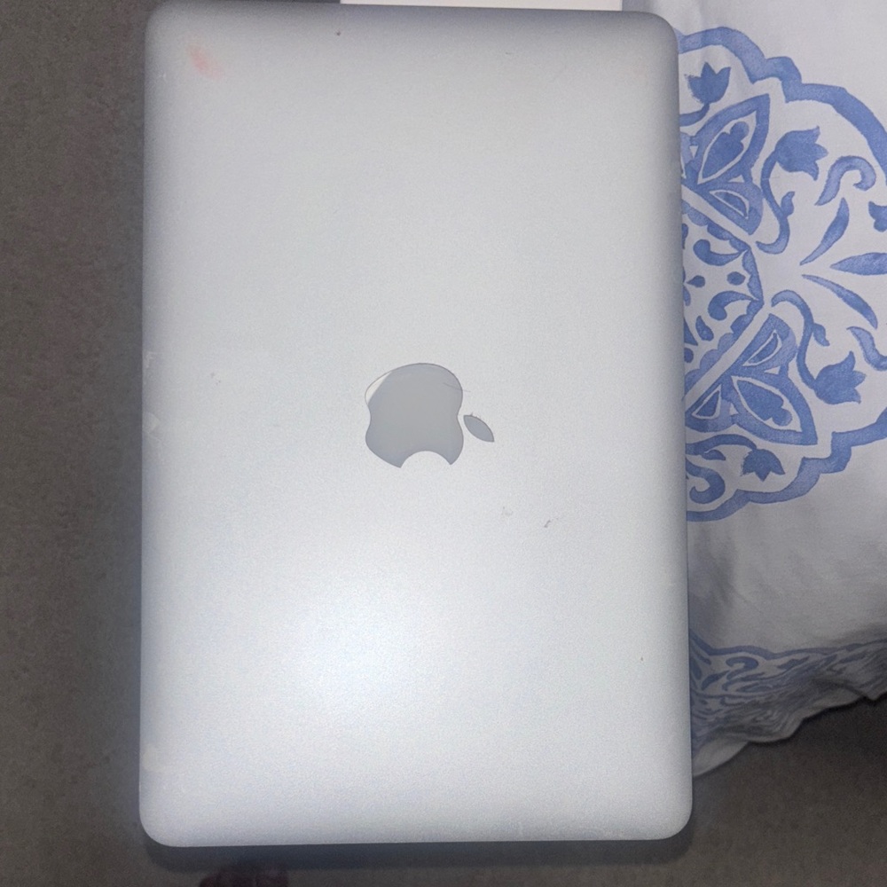 Apple Silver Laptop with Iconic Logo